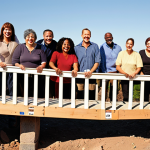 Building a Bridge of Trust**

Prompt: A diverse team of people collaboratively constructing a bridge. The bridge's foundation is labeled "Honesty," one support beam is labeled "Open Communication," and the other support beam is labeled "Effective Solutions." On one side of the bridge is a group of happy customers, and on the other side is the company team, smiling. Warm, inviting color palette, illustrating the power of trust in customer relations.

**